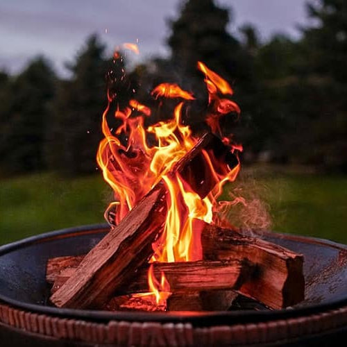 what wood not to burn in fire pit