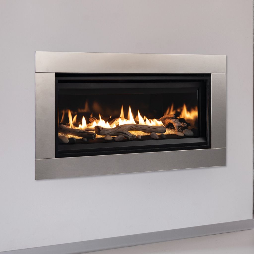 Superior Direct Vent Linear Gas Fireplace with Stainless Steel Trim and Driftwood Log Set Close Up