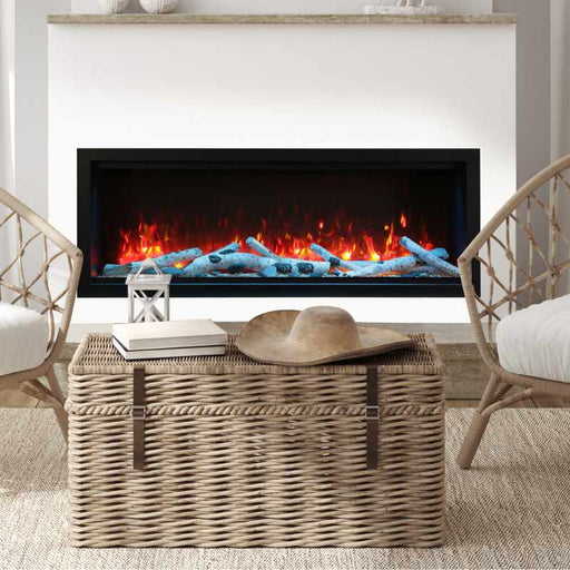 Amantii Symmetry Bespoke 60" Xtra Tall Electric Fireplace with Birch Logs built in to white wall in modern living room