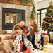 Ascent Multi-View See Thru with Logs in Living Room with Family on Christmas with Log Set Burner Assembly