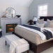 Dimplex Revillusion Traditional Electric Fireplace Placed in Bedroom