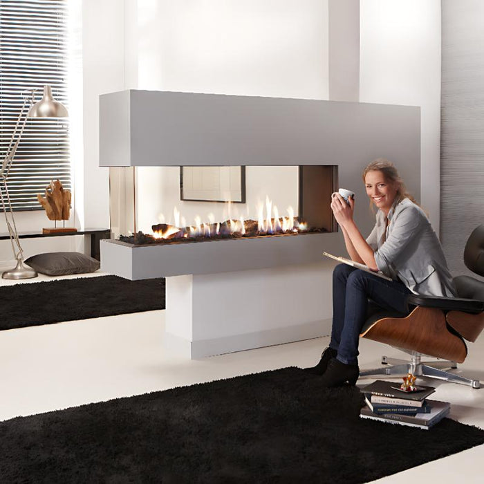 Element4 Lucius 140 Roomdivider (54 Linear Peninsula Direct Vent Gas Fireplace) with elegant lady at Private space with Ceramic Glass, Black Mesh Safety Screen plus ceramic fire bed with heat-resistant ceramic and Logs set V2