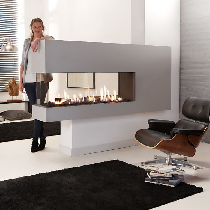 Element4 Lucius 140 Roomdivider (54 Linear Peninsula Direct Vent Gas Fireplace) with elegant lady at Private space with Ceramic Glass, Black Mesh Safety Screen plus ceramic fire bed with heat-resistant ceramic and Logs set