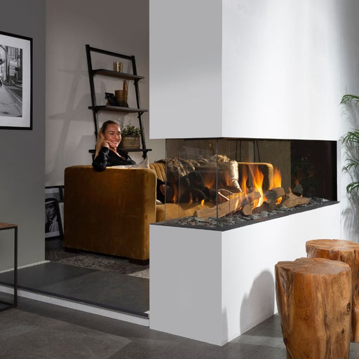 Element4 SUMMUM 140 RD Real Flame Burner with True-to-Nature Wood Logs installed  between private space with a beautiful girl resting and bedroom