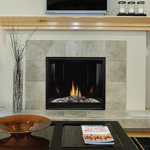 Empire Tahoe Premium Clean-Face Direct-Vent Fireplace (DVCC36BP) with Black Porcelain Liner and  Decorative Rock Set, Installed in a Custom Mantel with Custom Surround