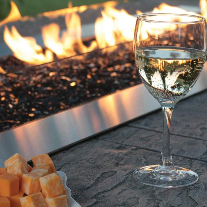 Enjoy some wine cheese by the Carol Rose Premium Outdoor Stainless Steel Linear Fire Pit