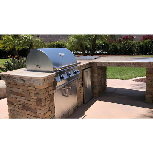 Fire Magic 77" Contemporary Outdoor Kitchen Island with Refrigerator Placed in Outside Garden Area