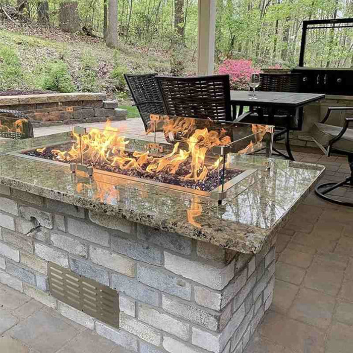 HPC Fire 14x4.5 Stainless Steel Louvered Enclosure Vents in a Linear Fire Pit with Gas Fire and Wind Guard 