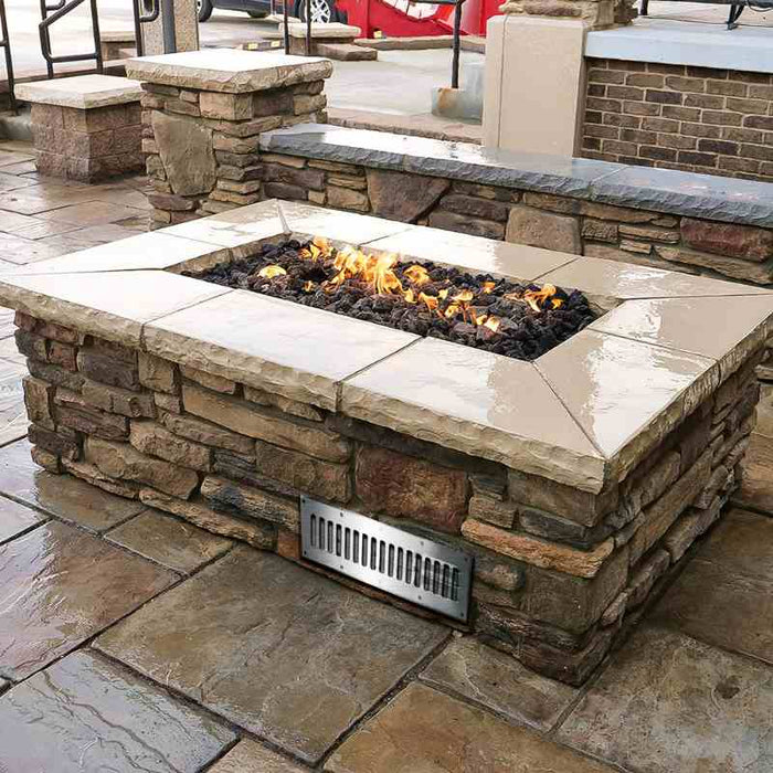 HPC Fire 8x4 Stainless Steel Enclosure Vents in a Fire Pit Installed with Lava Rock 