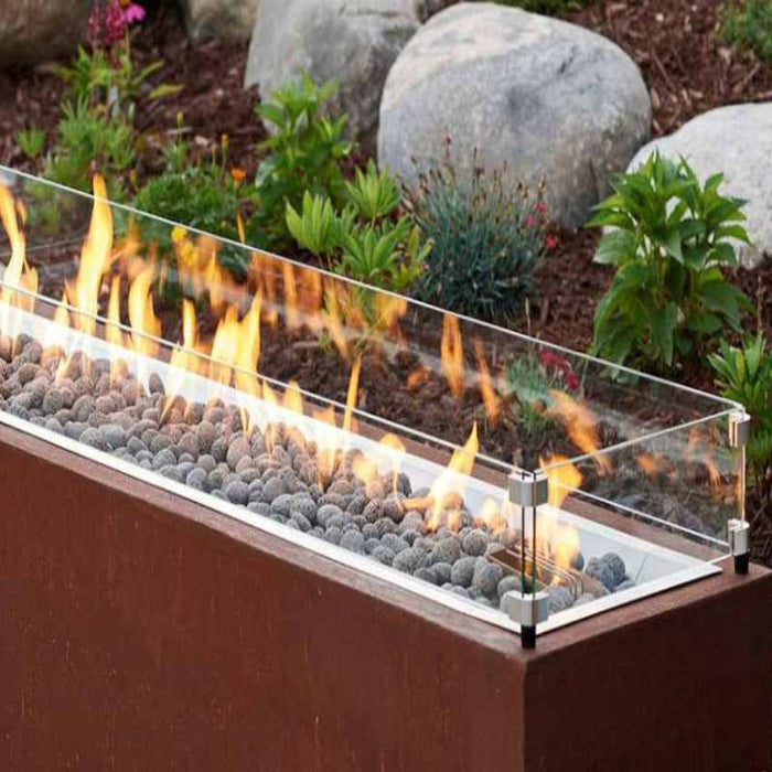 HPC Fire Linear Glass Wind Guards Placed in Linear Size Fire Pit with Rolled Lava Stones 