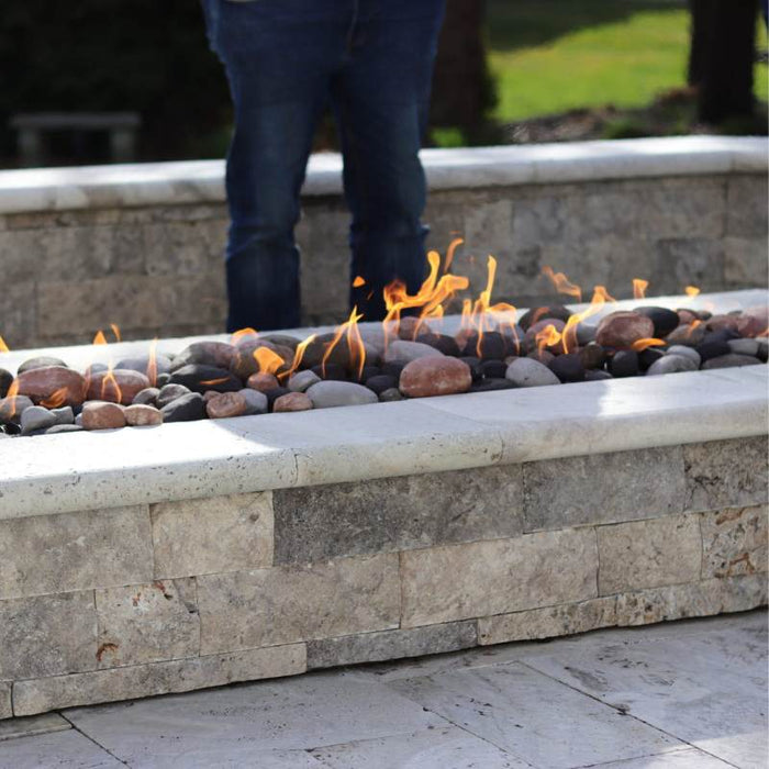 HPC Fire Linear Trough Fire Pit Burner Insert placed in Outdoor  Area with  Multicolor Ceramic River Rock