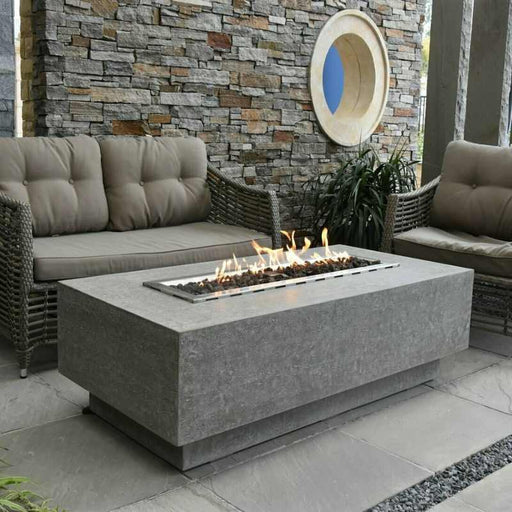 HPC Fire Ready-To-Finish Rectangle Fire Pit Kit Placed in Outdoor Living Area Installed with Lava Rock