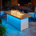 Havenwood 62" with Pebble grey Everblend top and White baseOutdoor with Clear Tempered Fire Glass Gems Fire and Lights On