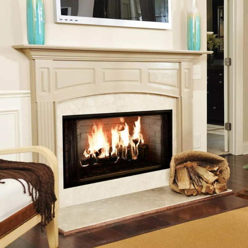 Majestic Royalton Wood Burning Fireplace with Fire Roaring under tan mantel