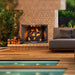 Majestic Cottagewood 42" Outdoor Wood Burning Fireplace Placed in Poolside Area