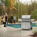 Napoleon Prestige Pro 665 Gas Grill with Infrared Rear and Side Burners Outdoor with Friends near Pool