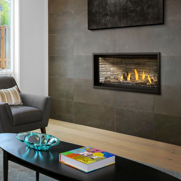 Napoleon Ascent Premium 46 Linear Direct Vent Gas Fireplace Installaed in Livingroom with Ledgestone Brick Panel and  Driftwood Logs 