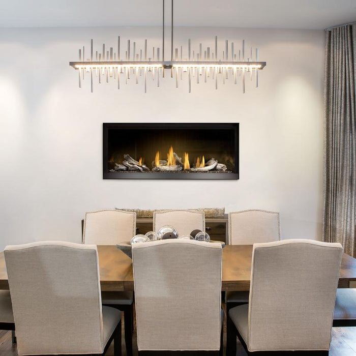 Napoleon Ascent Premium 46 Linear Direct Vent Gas Fireplace Installed in Dining Room with MIRRO-FLAME Porcelain Reflective Panel  