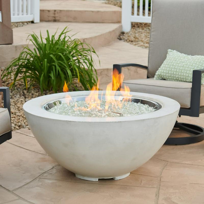 Outdoor Greatroom White  Cove 42 Round Gas Fire Pit Bowl Placed at Front Yard with Clear Tempered Fire Glass Gems plus Fire Burner On