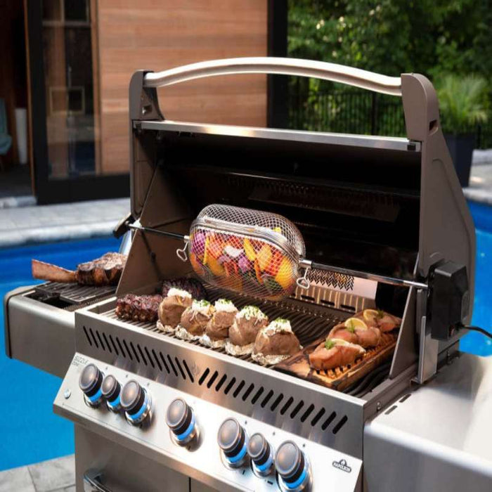 Prestige 665 Gas Grill with Infrared Side and Rear Burners Outdoor near Pool with Grilled foods