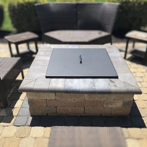 Stainless Steel Cover with Handle  Square Placed in a Square Fire Pit Installed in Garden Area