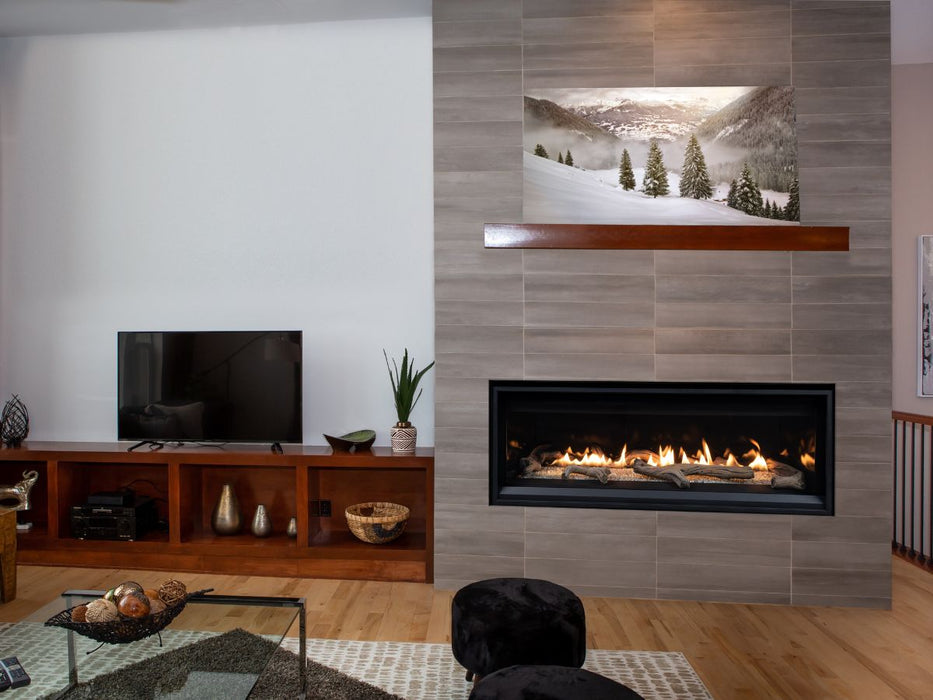 Superior 55 Direct Vent Linear Gas Fireplace DRL3555 No surround with driftwood log set in family room next to TV 1200x900px