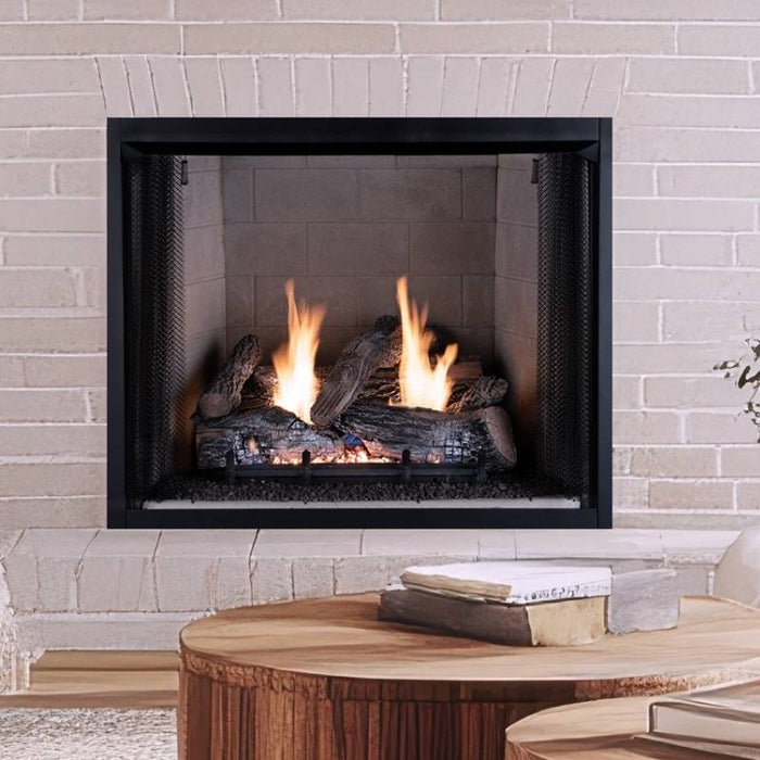 Superior Granite Ridge vent free gas log set burning in a white brick fireplace