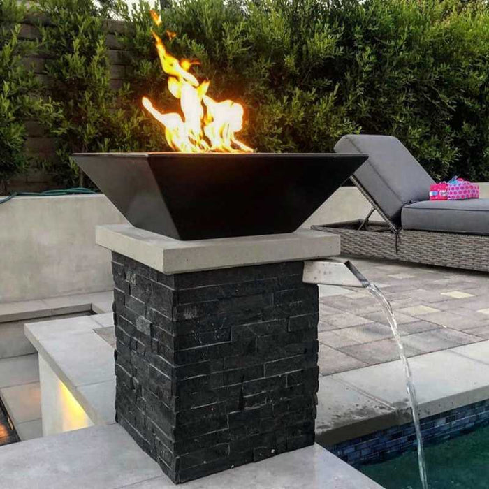 The Malibu Square Fire Bowl in Black Concrete Placed at the Poolside with Bullet Burner On
