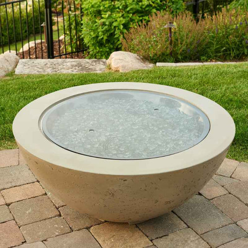 The Outdoor Greatroom30 Round Glass Burner Cover Installedat the Frontyard with Clear Tempered Fire Glass Gems
