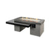 The Outdoor Greatroom Black Uptown Linear Gas Fire Pit Table with Clear Tempered Fire Glass Gems plus Fire Burner On