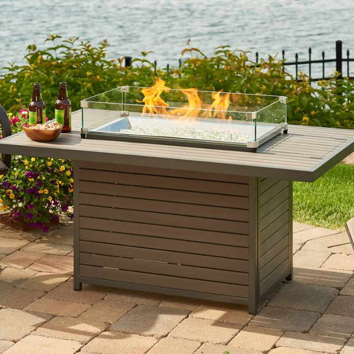 The Outdoor Greatroom Brooks Rectangular Gas Fire Pit Table River-side with Glass Wind Guard and Clear Tempered Fire Glass Gems