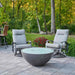 The Outdoor Greatroom Midnight Mist Cove Edge Round Gas Fire Pit Bowl place at Frontyard with Clear Tempered Fire Glass Gems