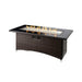 The Outdoor Greatroom Montego Linear Gas Fire Pit Table with Clear Tempered Fire Glass Gems plus Fire Burner On 