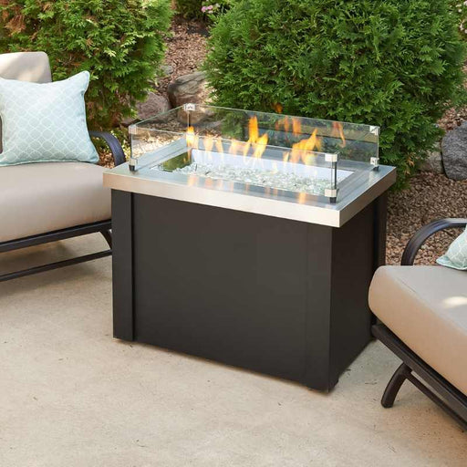 The Outdoor Greatroom Providence Rectangular Gas Fire Pit Table Outdoor with Clear Tempered Fire Glass Gems and Glass Wind Guard Installed