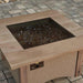 The Outdoor Greatroom Square Glass Burner Cover Installed with Clear Tempered Fire Glass Gems on Sierra Gas Fire Pit Table