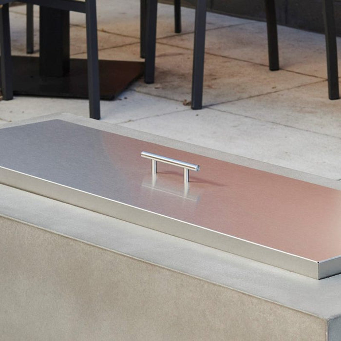 The Outdoor Greatroom Stainless Steel Burner Cover used on Cove Linear Gas Fire Pit Table Scaled