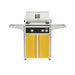 American Outdoor Grill 24" L-Series Portable Gas Grill with black accent panel and yellow accent panel cart base, large analog thermometer and push-button electronic ignition with backlit comfort-touch control knobs.