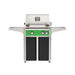American Outdoor Grill 24" L-Series Portable Gas Grill with green accent panel and black accent panel cart base, large analog thermometer and push-button electronic ignition with backlit comfort-touch control knobs.