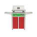 American Outdoor Grill 24" L-Series Portable Gas Grill with green accent panel and red accent panel cart base, large analog thermometer and push-button electronic ignition with backlit comfort-touch control knobs.