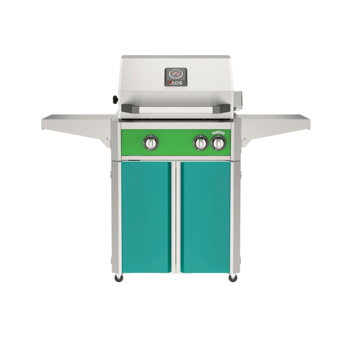 American Outdoor Grill 24" L-Series Portable Gas Grill with green accent panel and teal accent panel cart base, large analog thermometer and push-button electronic ignition with backlit comfort-touch control knobs.