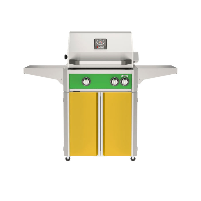 American Outdoor Grill 24" L-Series Portable Gas Grill with green accent panel and yellow accent panel cart base, large analog thermometer and push-button electronic ignition with backlit comfort-touch control knobs.