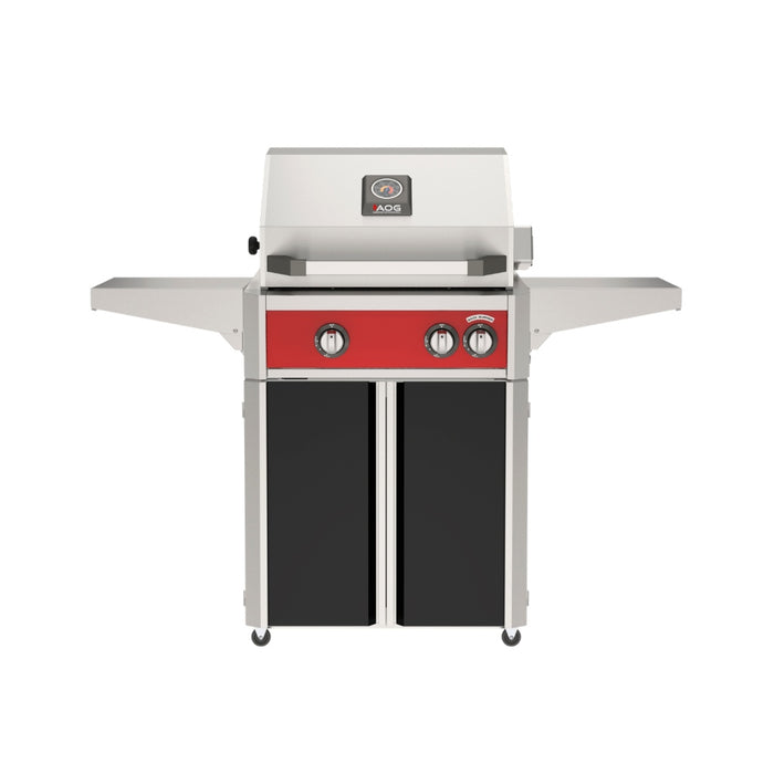 American Outdoor Grill 24" L-Series Portable Gas Grill with red accent panel and black accent panel cart base, large analog thermometer and push-button electronic ignition with backlit comfort-touch control knobs.