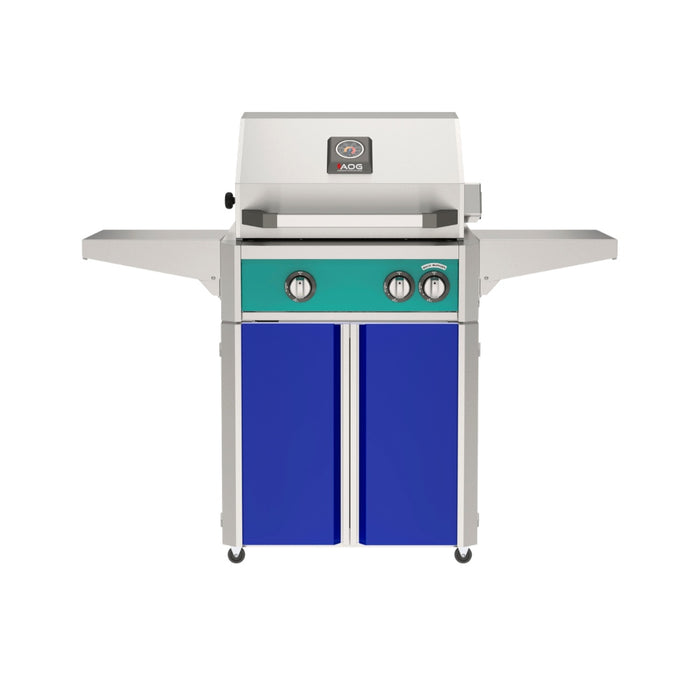 American Outdoor Grill 24" L-Series Portable Gas Grill with teal accent panel and blue accent panel cart base, large analog thermometer and push-button electronic ignition with backlit comfort-touch control knobs.