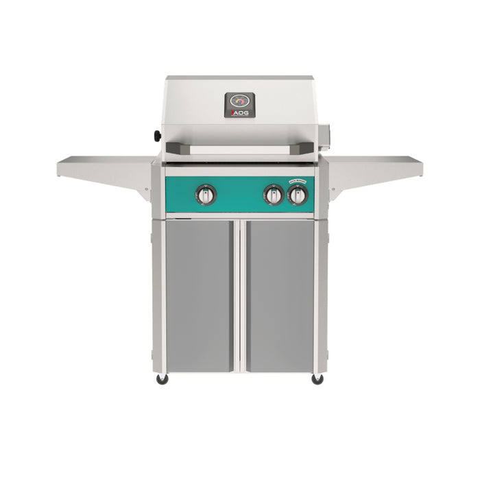 American Outdoor Grill 24" L-Series Portable Gas Grill with teal accent panel and gray accent panel cart base, large analog thermometer and push-button electronic ignition with backlit comfort-touch control knobs.