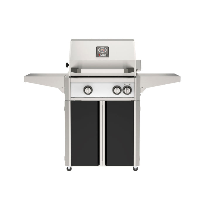 American Outdoor Grill 24" L-Series Portable Gas Grill with white accent panel and black accent panel cart base, large analog thermometer and push-button electronic ignition with backlit comfort-touch control knobs.
