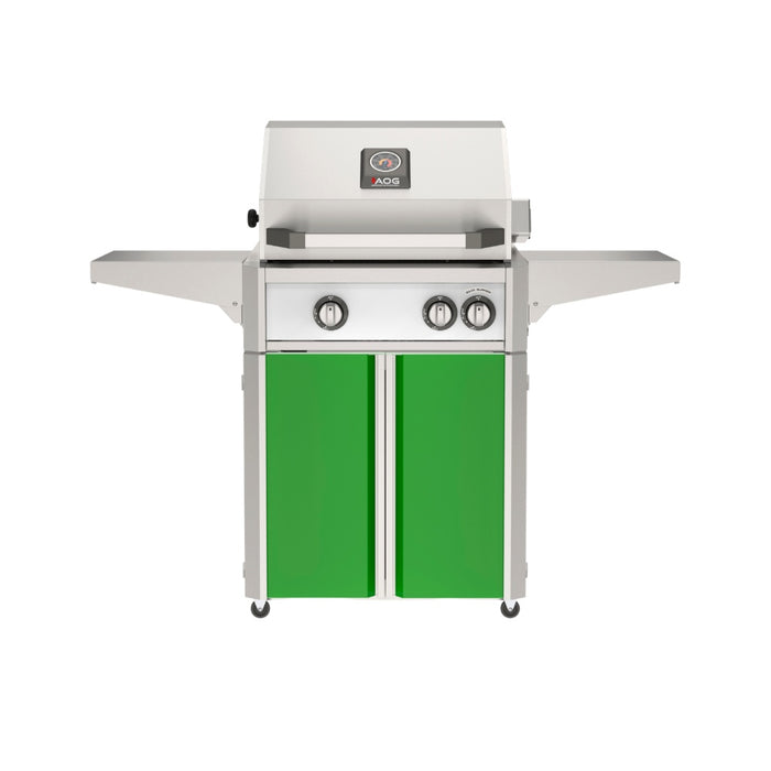 American Outdoor Grill 24" L-Series Portable Gas Grill with white accent panel and green accent panel cart base, large analog thermometer and push-button electronic ignition with backlit comfort-touch control knobs.