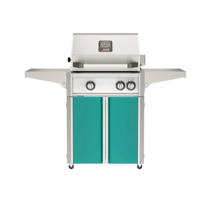 American Outdoor Grill 24" L-Series Portable Gas Grill with white accent panel and teal accent panel cart base, large analog thermometer and push-button electronic ignition with backlit comfort-touch control knobs.