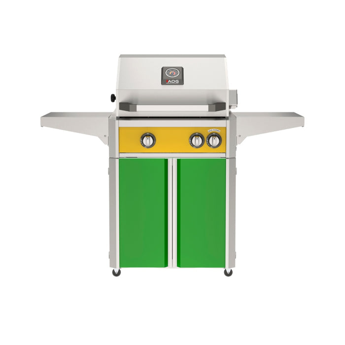 American Outdoor Grill 24" L-Series Portable Gas Grill with yellow accent panel and green accent panel cart base, large analog thermometer and push-button electronic ignition with backlit comfort-touch control knobs.