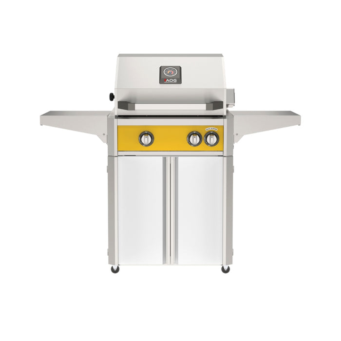 American Outdoor Grill 24" L-Series Portable Gas Grill with yellow accent panel and white accent panel cart base, large analog thermometer and push-button electronic ignition with backlit comfort-touch control knobs.