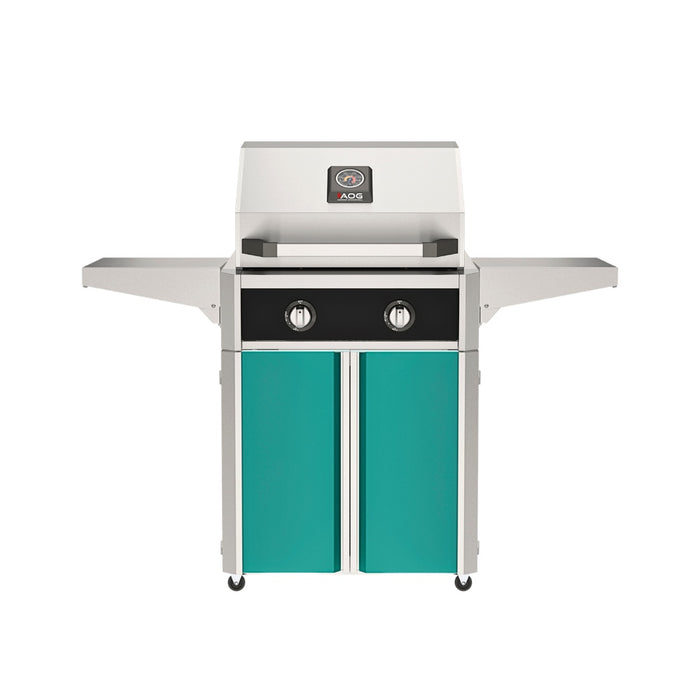 American Outdoor Grill 24" T-Series Portable Gas Grill with black accent panel and teal accent panel cart base, large analog thermometer and push-button electronic ignition with backlit comfort-touch control knobs.
